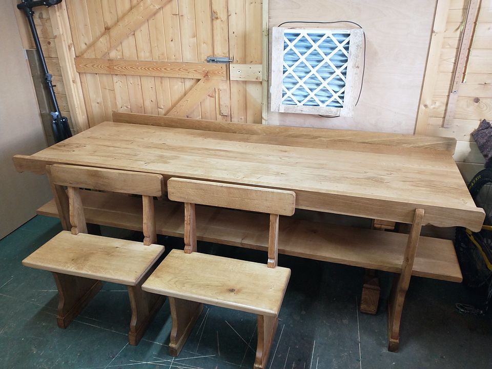 Solid-wood table and benches in the workshop